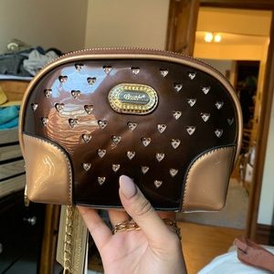 Crossbody chain purse with hearts “pockets of gems”